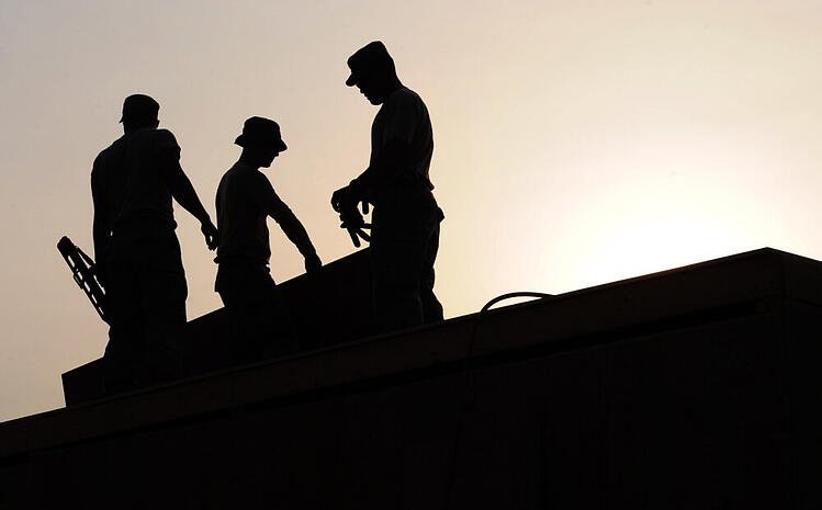 tradesmen-on-roof.jpg