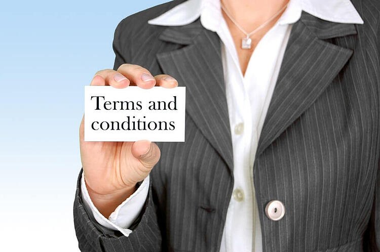 woman-holding-terms-and-conditions-sign.jpg