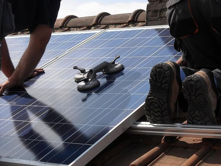 men-installing-solar-panels.jpg